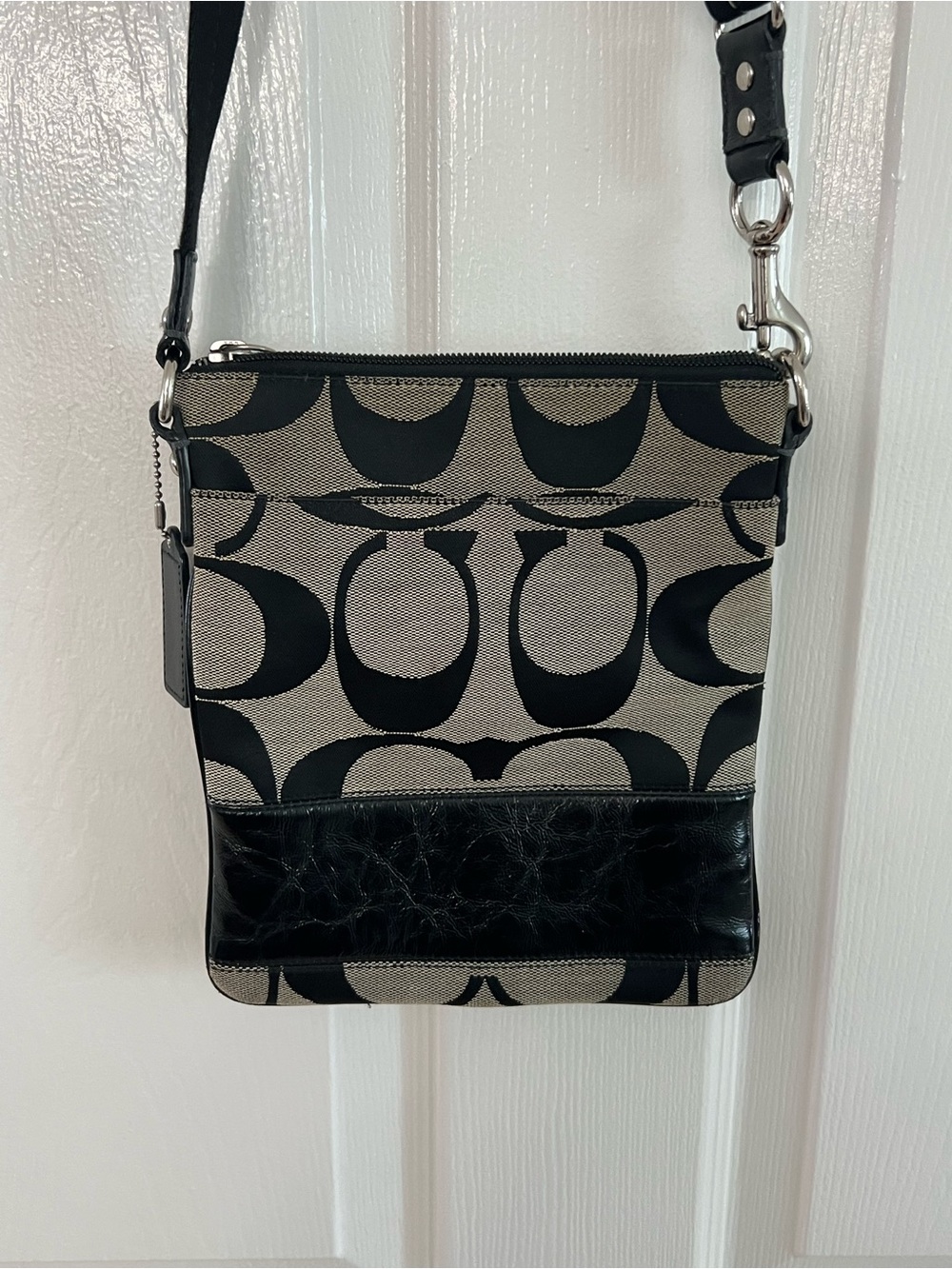 Coach Black and Beige Signature Canvas Swingpack Bag